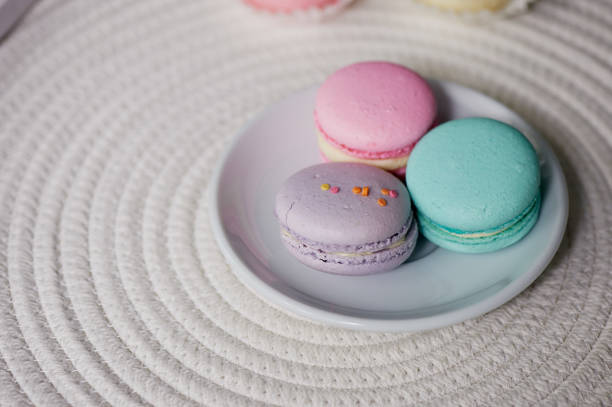 istock Macaroon pastel tones on a wooden background.Beautiful sweets 699847346