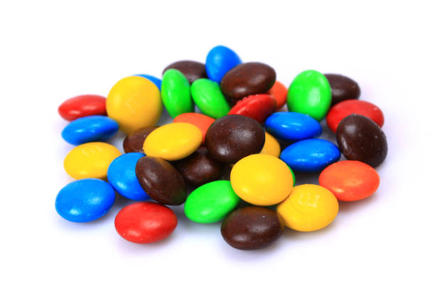 istock Colorful chocolate beans，Chocolate candy   on the white background 699855992