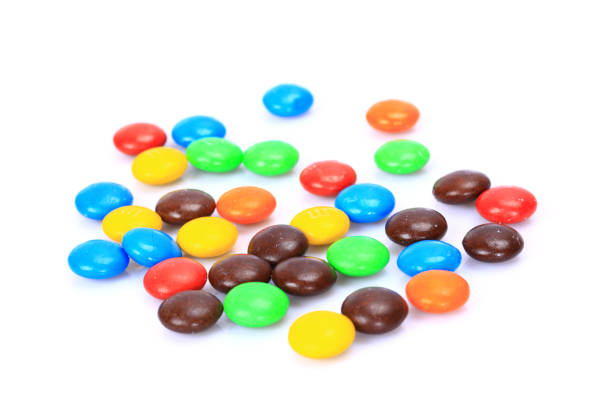 istock Colorful chocolate beans，Chocolate candy   on the white background 699856008