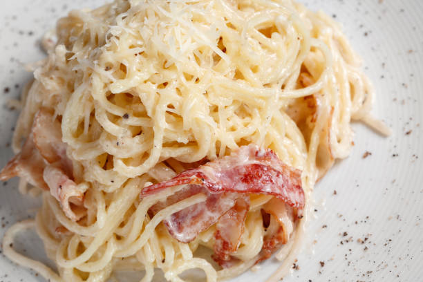 istock Pasta Carbonara. Spaghetti with bacon, parsel and parmesan cheese. 699868640
