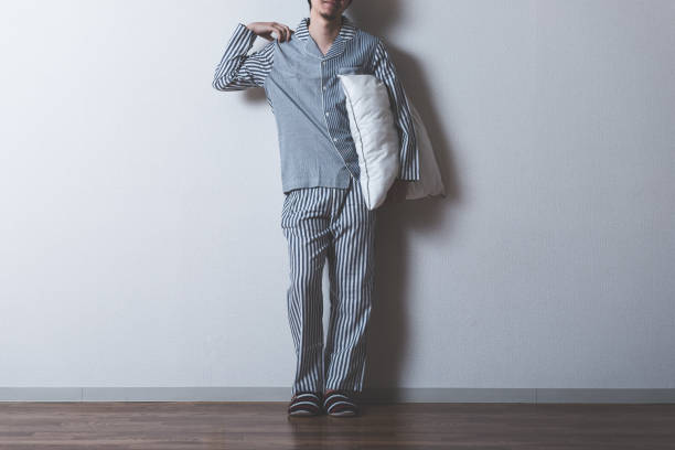 istock Men wearing pajamas 699873720