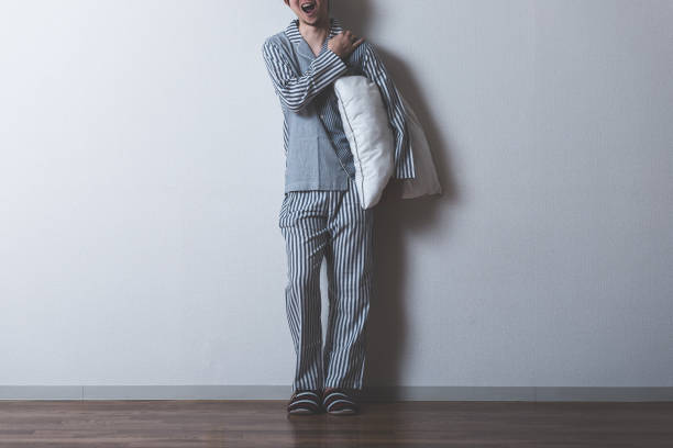 istock Men wearing pajamas 699878272