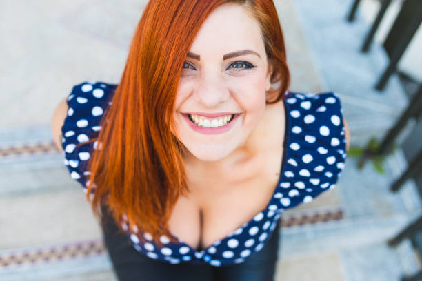 istock Redhead smiling woman portrait 699878876