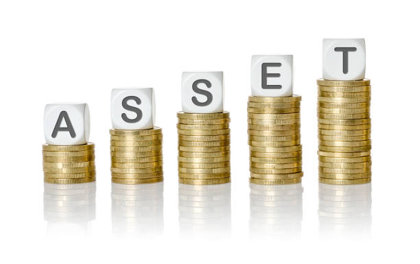 istock Coin stacks with letter dice - Asset 699889312