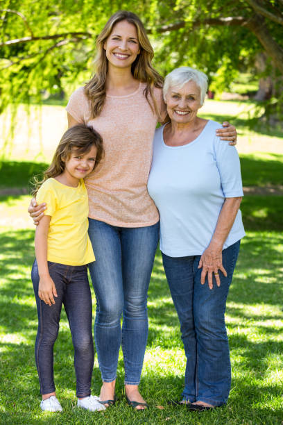 istock Smiling family standing 699891266