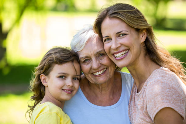 istock Smiling family standing 699891354