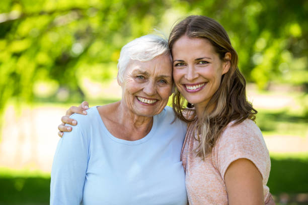 istock Family standing and smiling 699891474