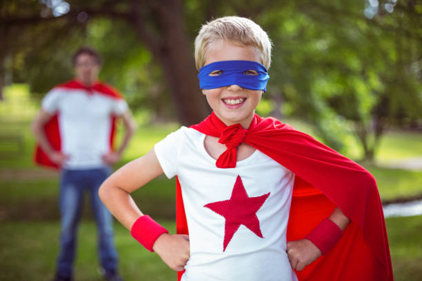 istock Father and son dressed as superhero 699896528