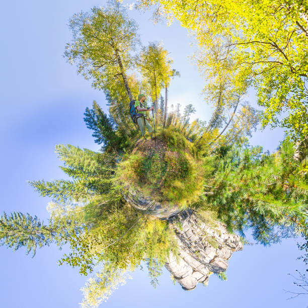 istock Spherical panorama 360 180 tourist with a backpack walking throu 699962006