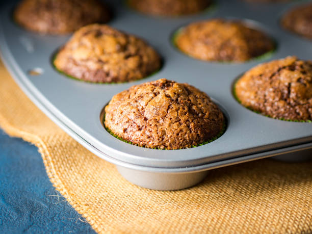 istock Banana chocolate muffin with caramel sugar topping 699993254