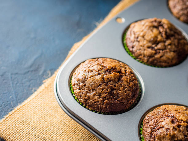 istock Banana chocolate muffin with caramel sugar topping 699993350