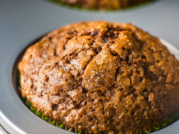 istock Banana chocolate muffin with caramel sugar topping 699993590
