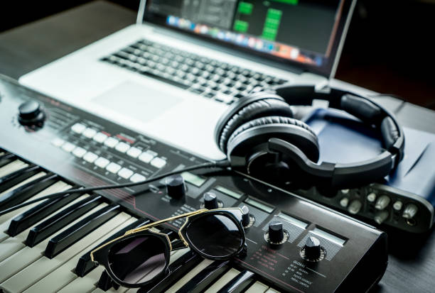 istock Computer Music Studio equipment with sunglasses on synthesizer 700072210