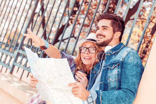 istock Couple of tourists 700076618