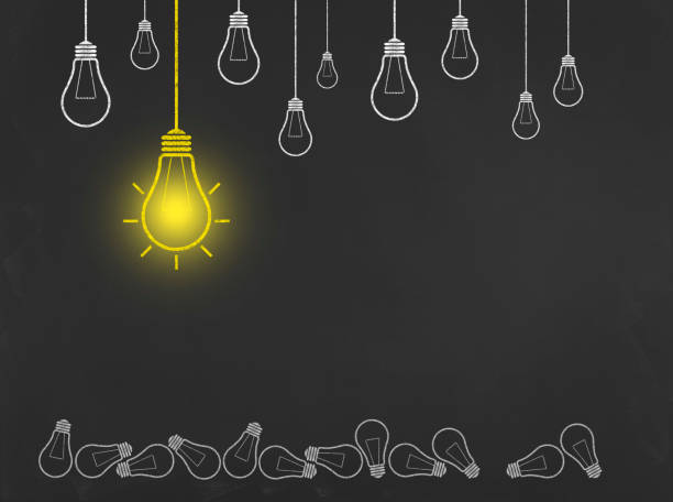 istock New Idea Light Bulb on Blackboard - Business Chalkboard Background 700084874