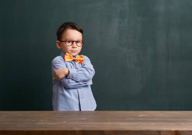 istock Child is in front of chalkboard 700100024