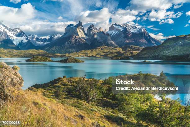 Blue Lake On A Snowy Mountains Background And Cloudy Sky Torres Del Paine Stock Photo - Download Image Now