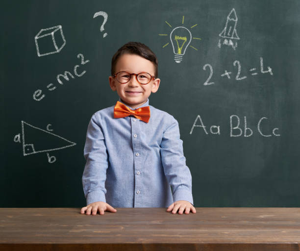 istock Child is in front of chalkboard 700100306