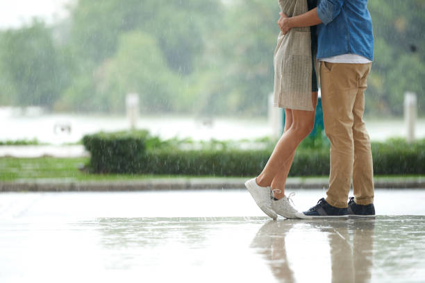 istock Couple Dating in Rain 700100412