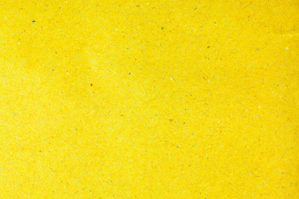 istock Recycle yellow paper background. 700110714