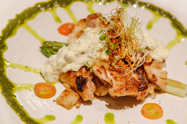 istock Chicken teriyaki with salad and basil pesto 700126110