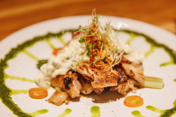 istock Chicken teriyaki with mix salad and basil pesto dressing 700126288
