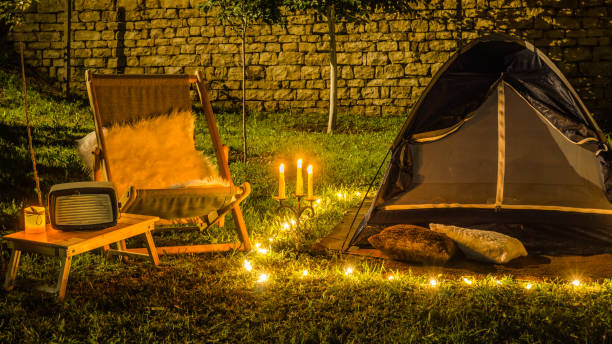 istock Romantic evening with a tent at night in the yard. 700144550