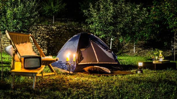istock Romantic evening with a tent at night in the yard. 700144558