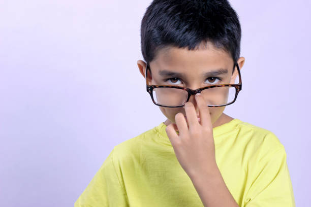 istock Indian child wear eyeglass 700164648