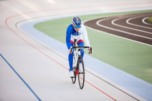 Cyclist pedaling on a racing bike outdoors
