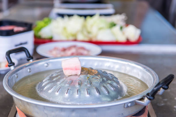istock stove for meat are being cooked, Korean barbecue 700168408