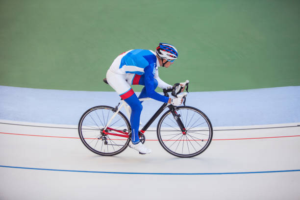 istock Racing cyclist on velodrome outdoor. 700168728