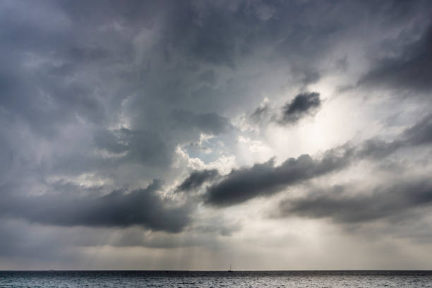 Cloudy sunset in the sea with metallic colors