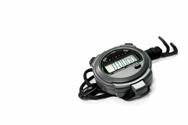 istock closeup stopwatch on white background. over light and sooft-focus 700184490