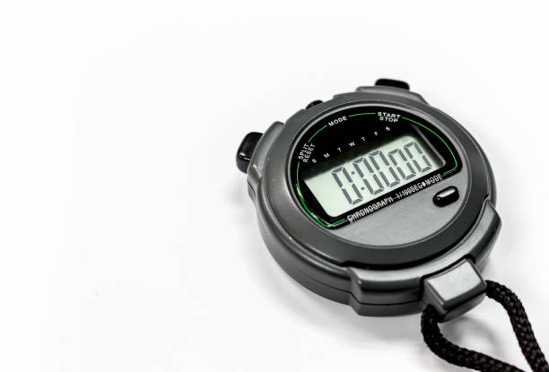 istock closeup stopwatch on white background. over light and sooft-focus 700184512