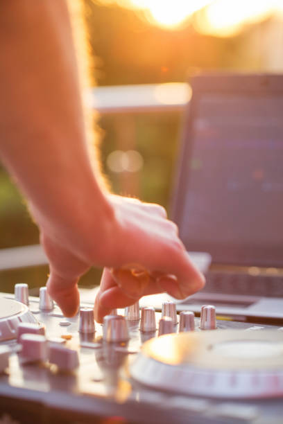 istock Dj mixing music outdoor. 700184794