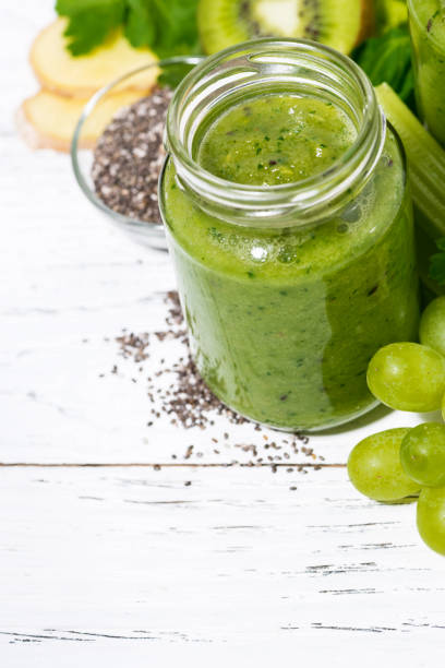 istock healthy green fruit and vegetable smoothies on white background 700184820