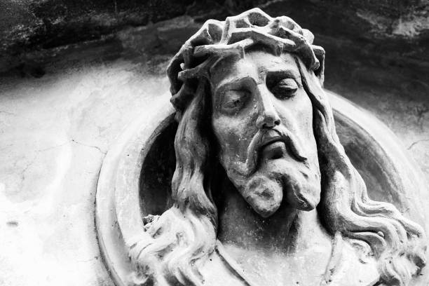 istock Face of Jesus Christ on a tomb 700185232