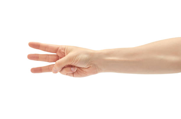 istock Beautiful female hand count three gesture. Isolated on white background 700193630