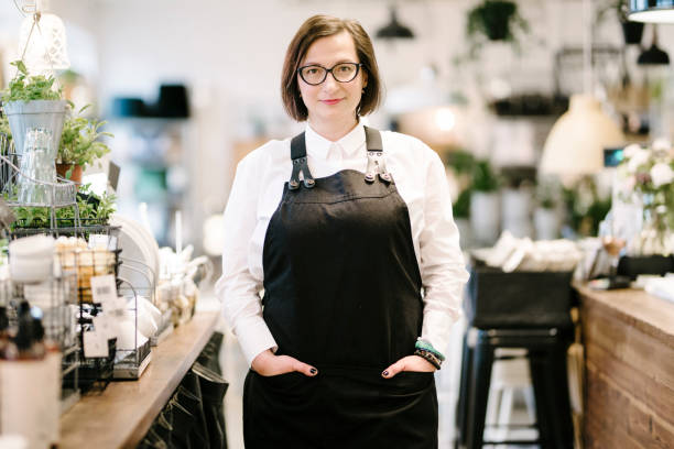 istock Female Business Owner in Store 700194236