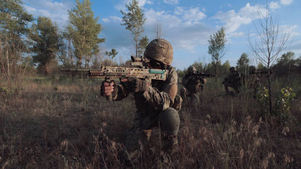 istock Military troop sitting and aiming 700197146