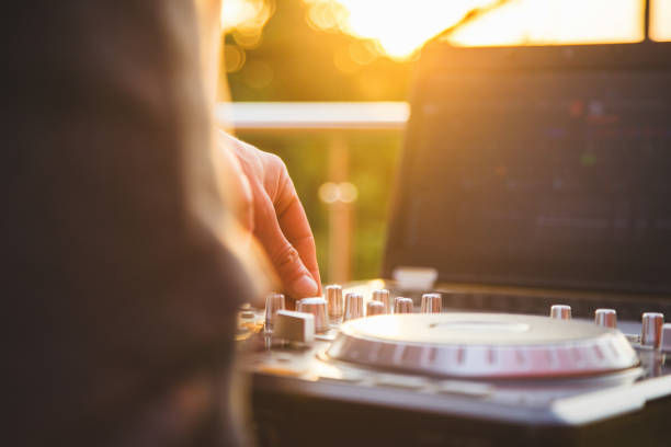 istock Dj mixing music outdoor. 700208168