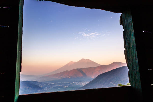 Dawn over two volcanoes: Fuego & Acatenango, near Antigua, Guatemala, Central America