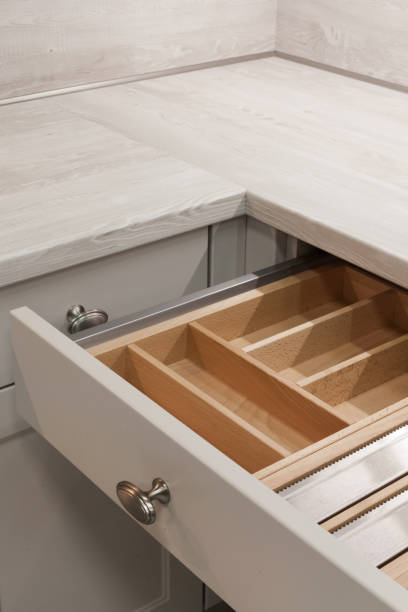 istock Open wooden drawer for cutlery 700234206