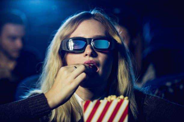 istock Eating popcorn in movies 700234714
