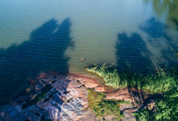 Aerial view on plain rocks in the sea Aerial view on plain rocks in the sea leisure activity french culture sport high angle view stock pictures, royalty-free photos & images