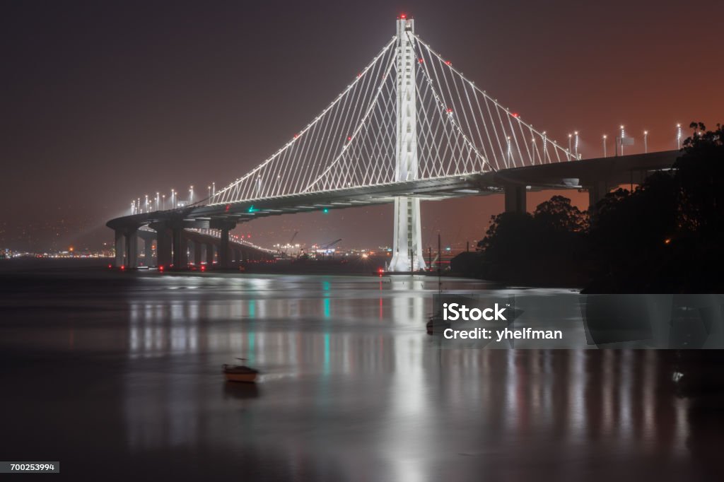 San Francisco-Oakland Bay Bridge Eastern Span at Night. Treasure Island, San Francisco, California, USA. New Stock Photo