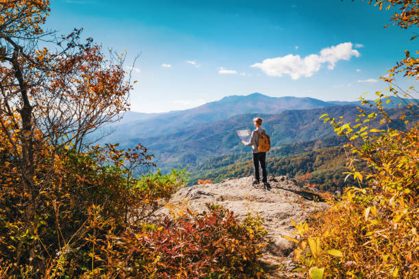 istock Man at the edge of a cliff 700257140