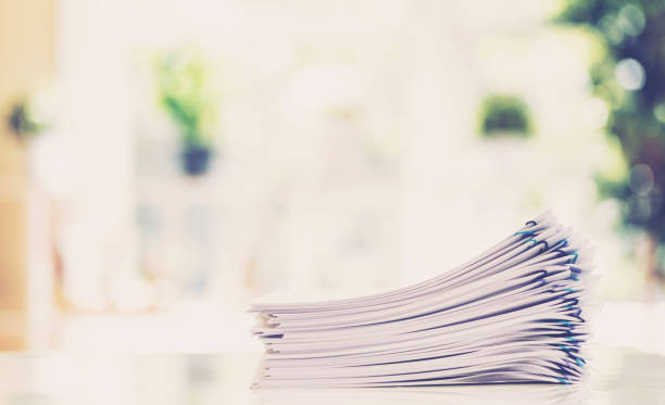 istock Pile of papers organized with paper clips 700268302