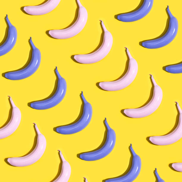 istock Series of painted pink and purple bananas 700268594